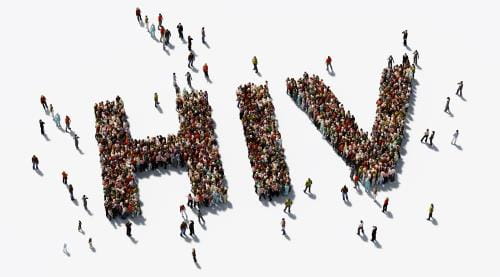 Diverse people seen from a bird's eye view gather to spell out the letters HIV