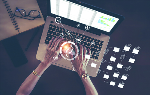 A person working at a computer represents the fact that data from some diagnostic devices is not inside the electronic medical record yet, such as continuous glucose monitors.